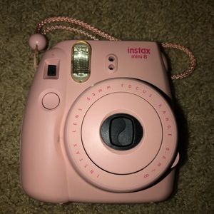 Polaroid camera and selfie lense.